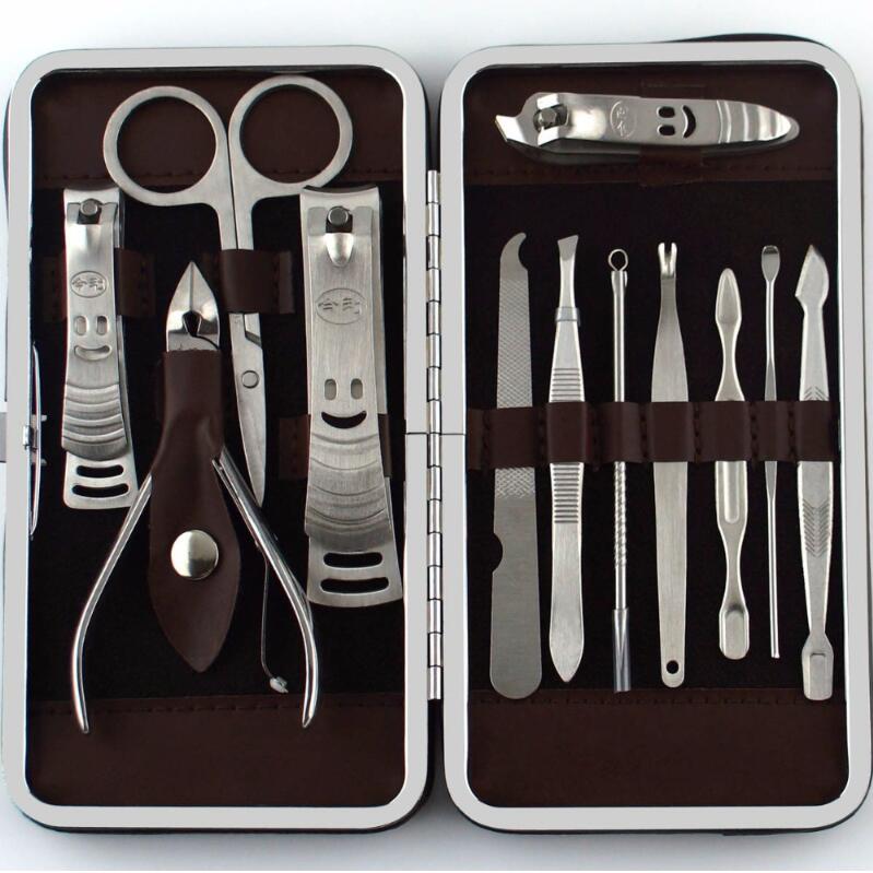 Color: silver - 12pcs manicure set pedicure scissor tweezer knife ear pick utility nail clipper kit ,stainless steel nail care tool set new