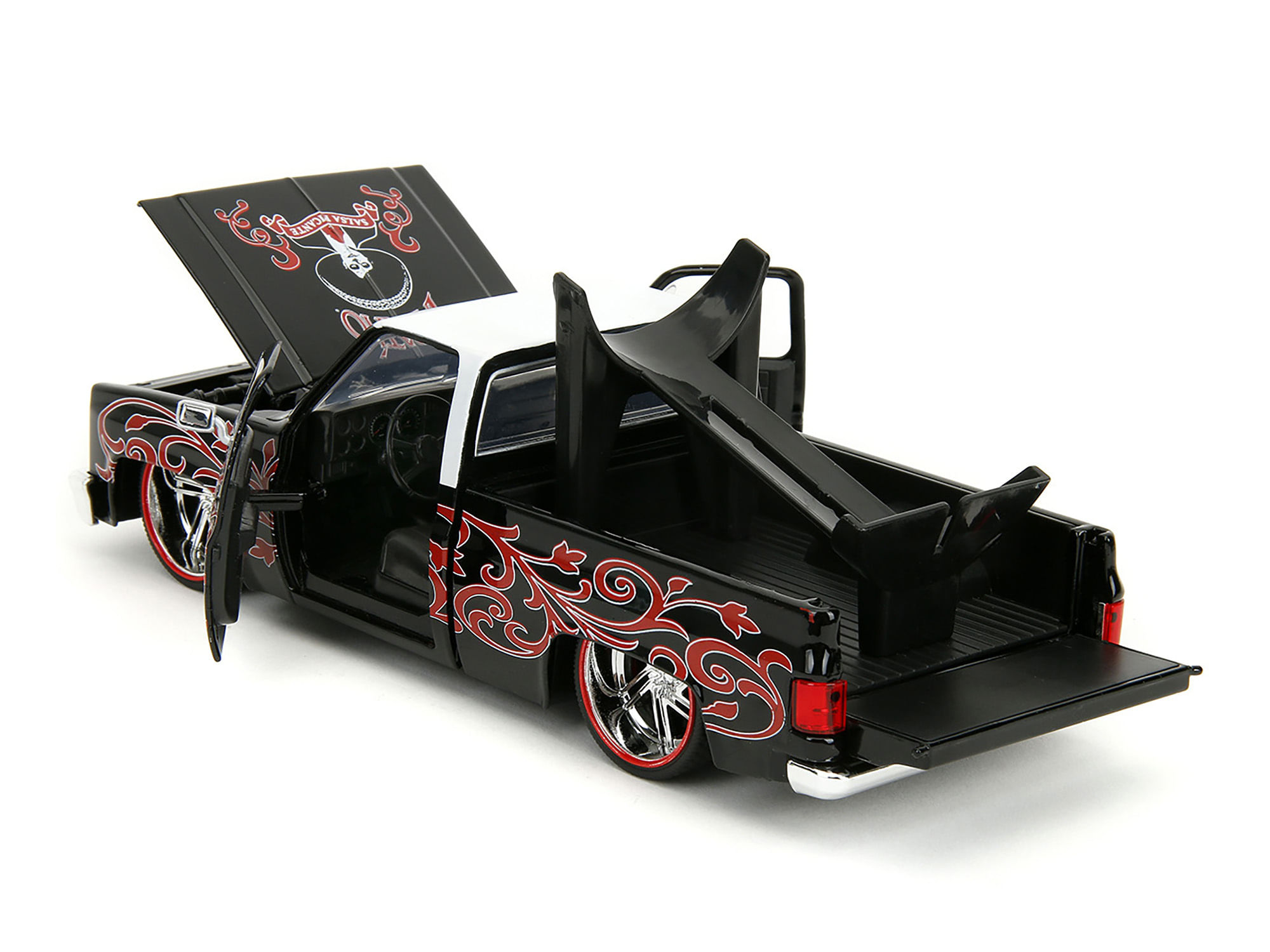 1985 chevrolet c-10 pickup truck black with white top and graphics with charro man diecast figure "tapatio" 1/24 diecast model car by jada