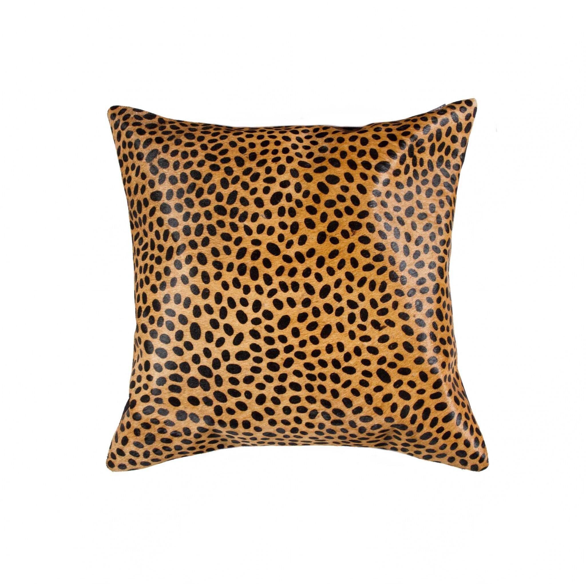 18" x 18" orange and black animal print cowhide zippered pillow